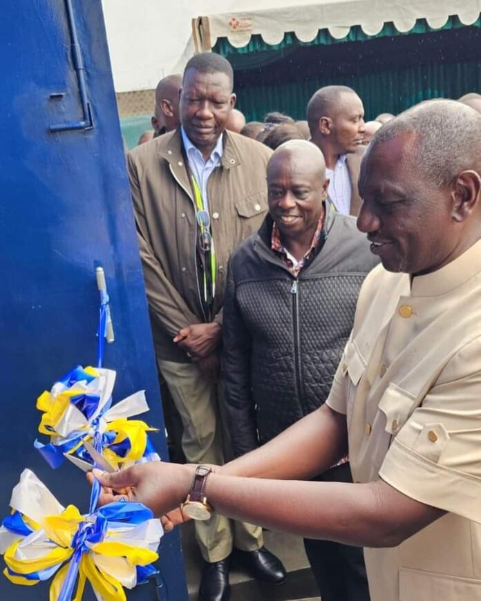 H. E. William Ruto, President of Kenya cutting a tape to officially commission a sub-station in Naivasha Special Economic Zone, in Mai Mahiu, Nakuru County.