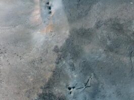 A satellite image from Maxar showing a cluster of holes at the Fordaw nuclear facility in Iran following US strikes. Pic: Maxar